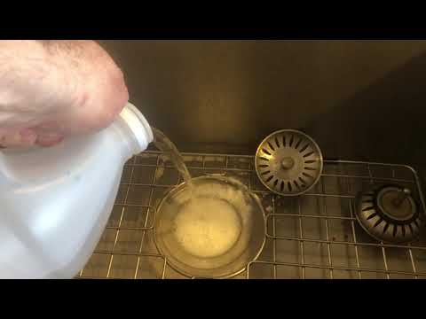 Unclog a sink with baking soda and vinegar