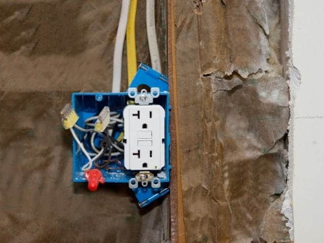 Should electrical box be installed flush with drywall?