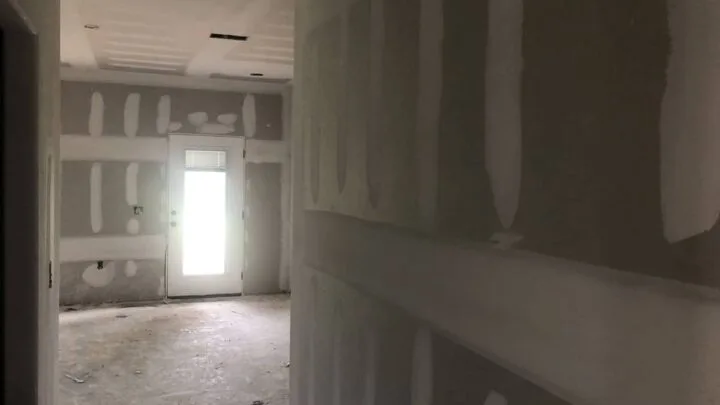 Should Drywall Touch the Floor? Best Practices Explained