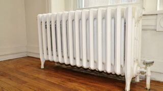 house radiator - will a stove fan improve it?
